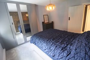 Bedroom One- click for photo gallery